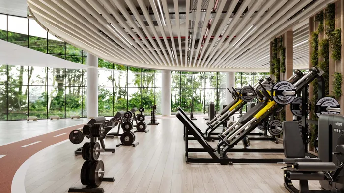 Strength training equipment in a spacious gym
